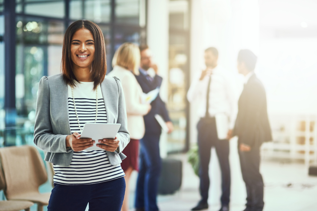 Another chance at success. Portrait of a young businesswoman usi